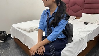 A cute teen with a ponytail plays an innocent schoolgirl, luring her boyfriend into hardcore sex. She strips, bends over, takes it deep, rides him wildly, and swallows it all, embodying the bold, passionate Indian teen archetype.